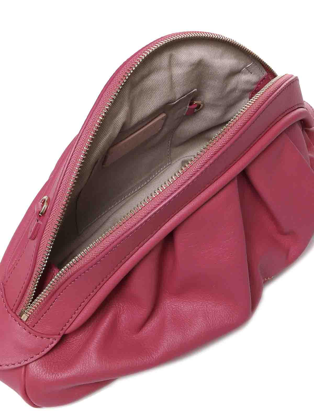 Shop Coccinelle Cheek Clutch In Rosado