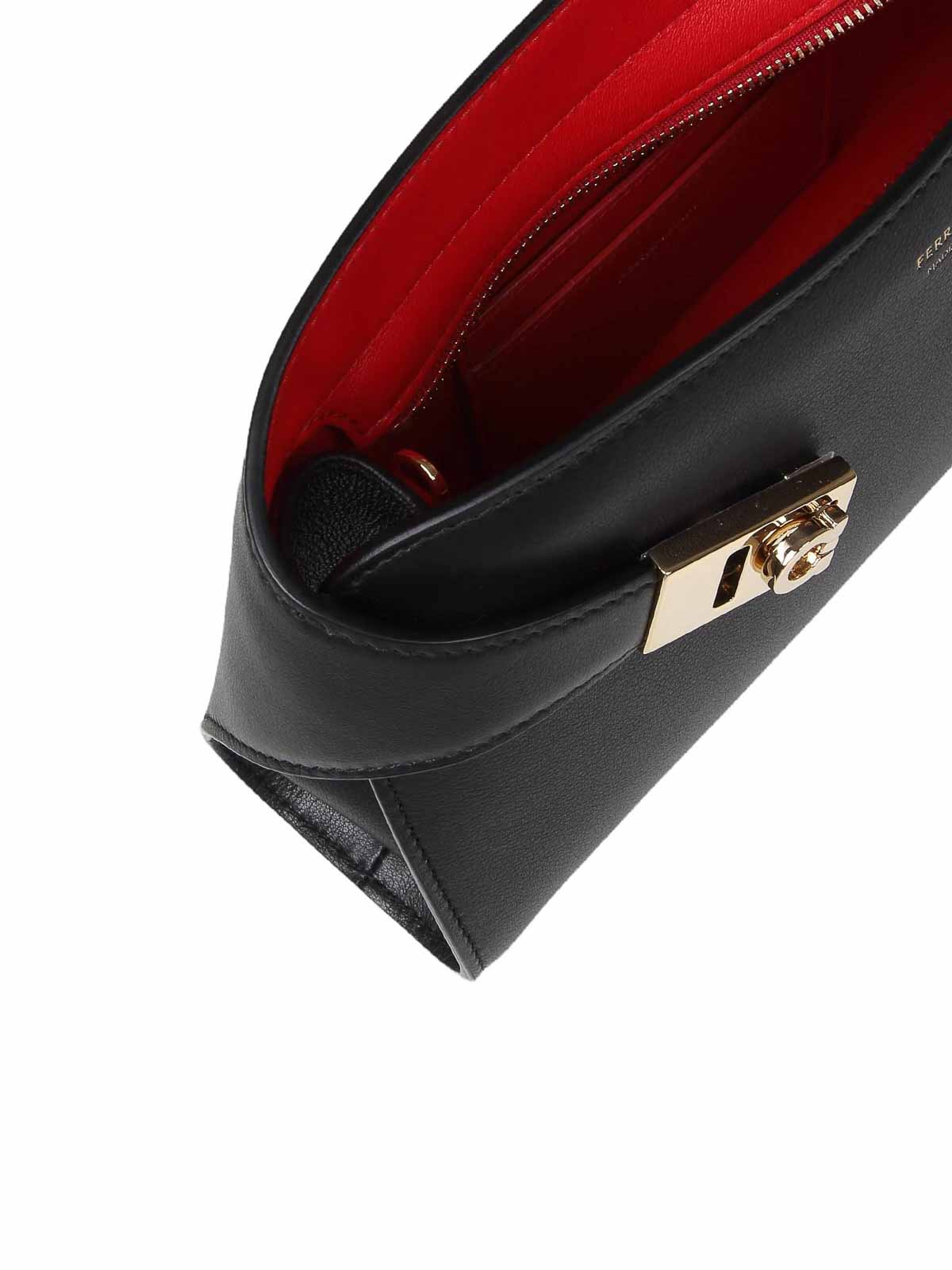 Shop Ferragamo Hug Clutch Bag In Black Leather