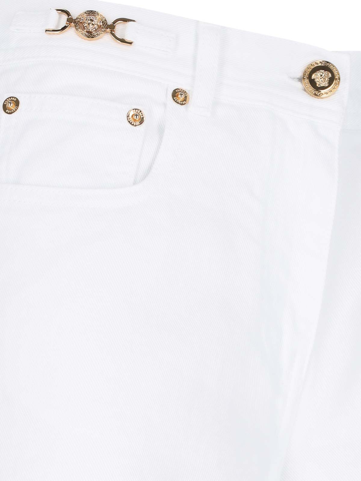 Shop Versace Palazzo Logo Jeans In White