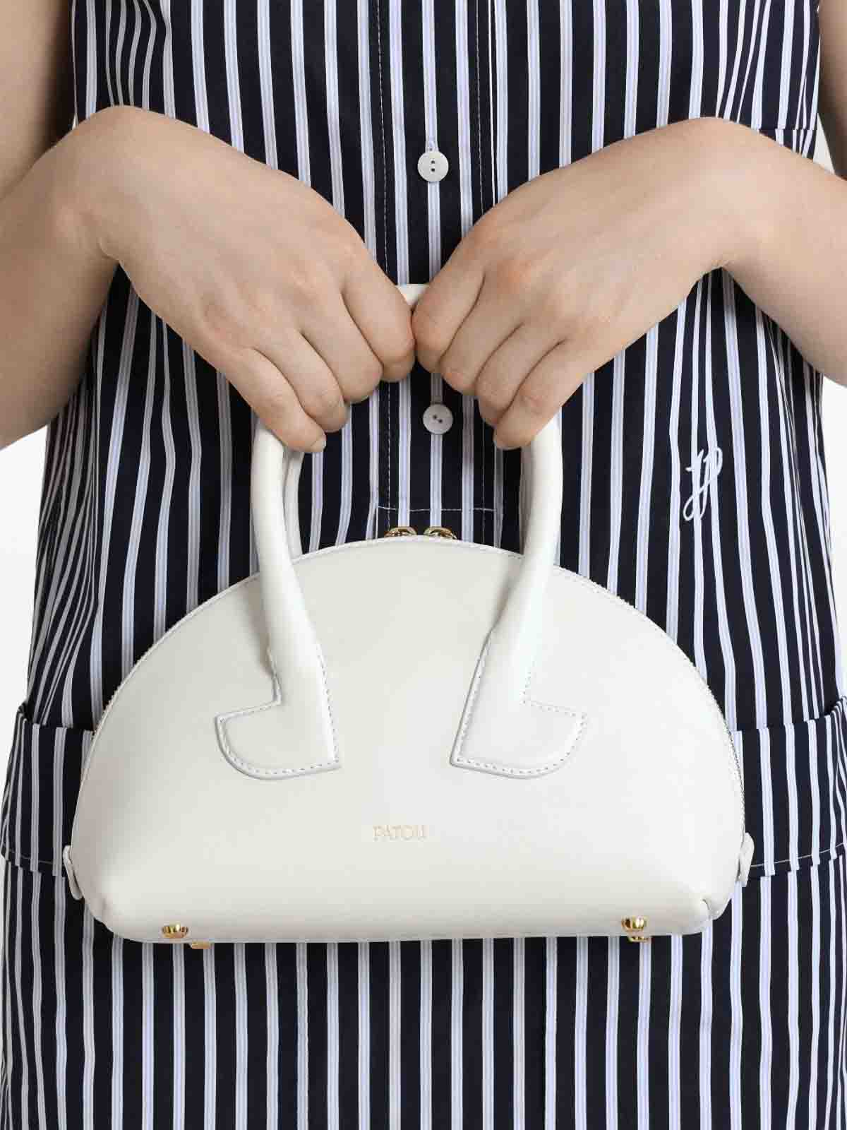 Patou Rounded White Calfskin Handbag With Gold Accents In White