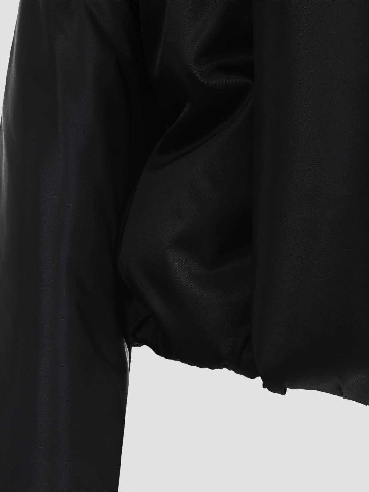 Alaïa Insulated Long Sleeve High Collar Jacket In Black