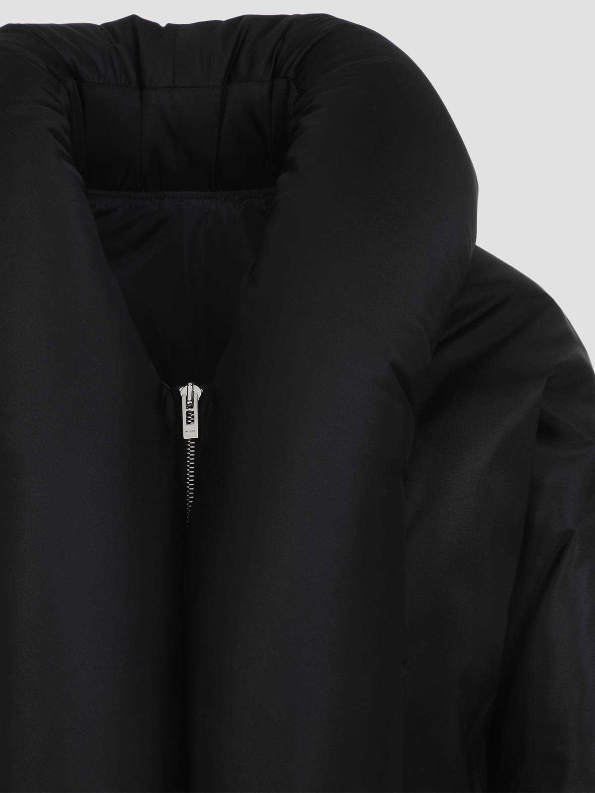 Alaïa Insulated Long Sleeve High Collar Jacket In Black