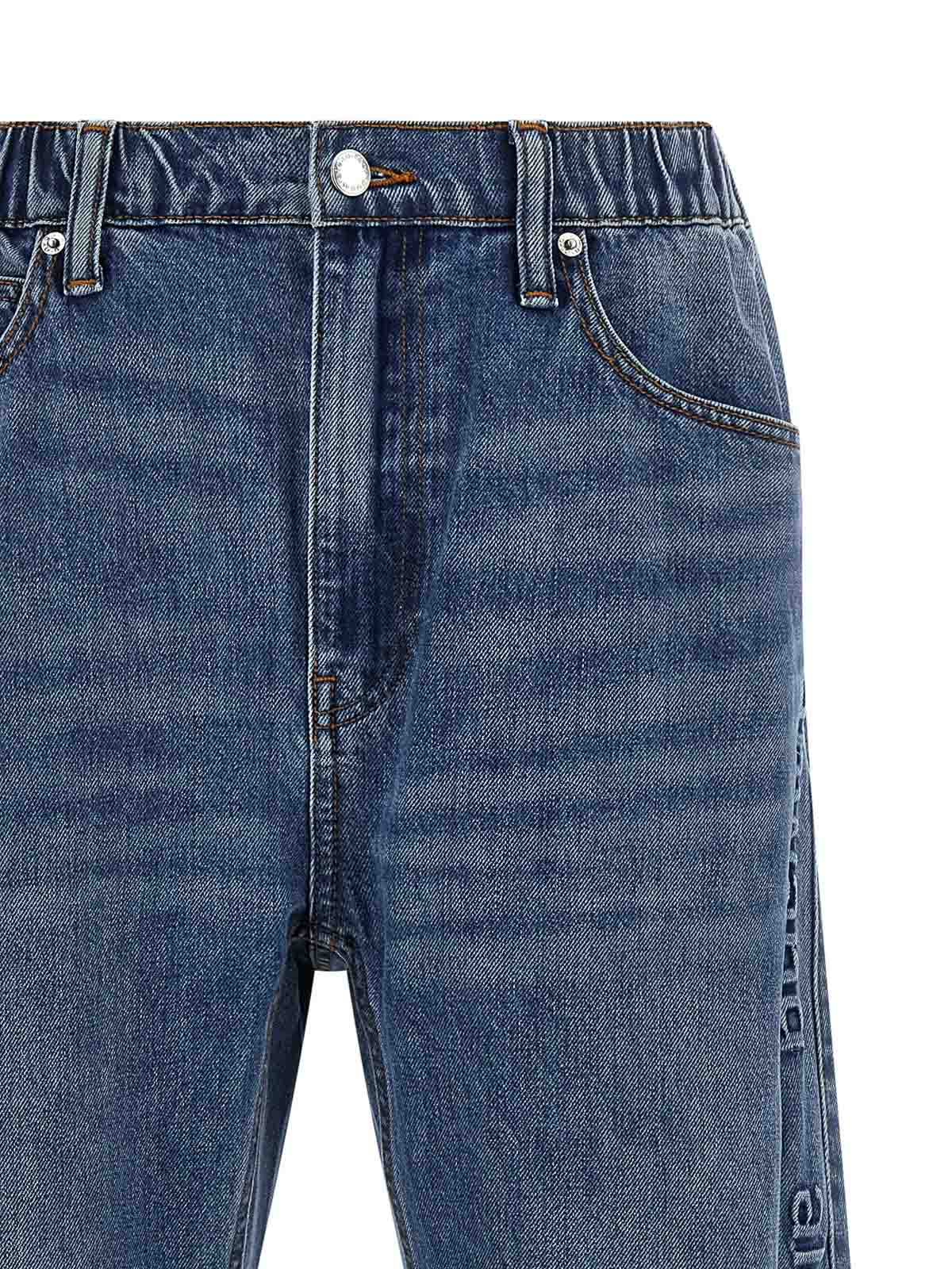 Alexander Wang Wide-leg Denim Jeans With Embossed Logo Detail In Blue
