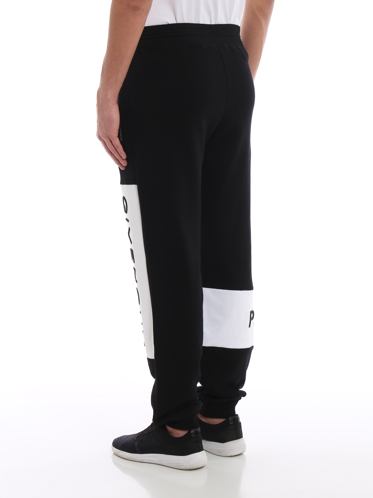 Givenchy Slim-fit Jogger Pants In Embroidered Fleece - Black | Editorialist
