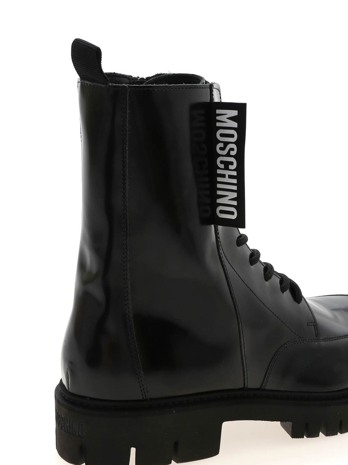 Shop Moschino Label Ankle Boots In Black In Negro