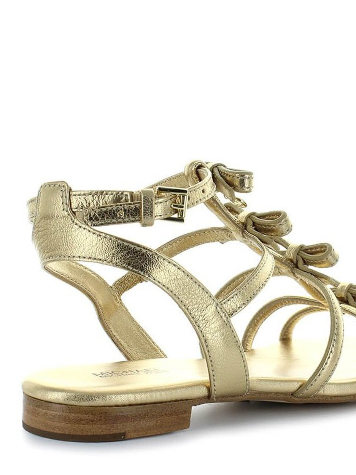 Buy Michael Kors Sling Back Logo Embossed Flat Sandals In Gold  6thStreet  Kuwait