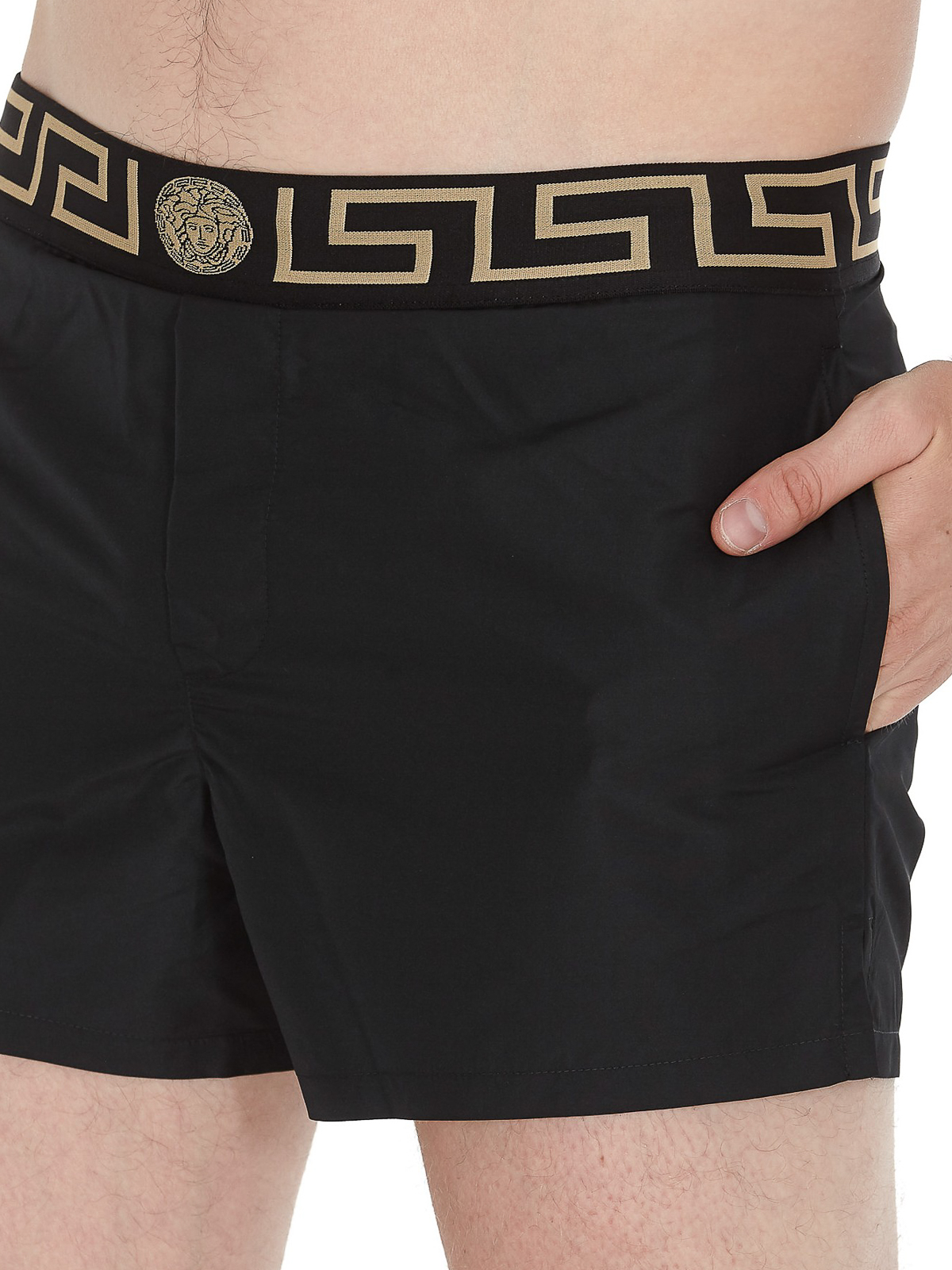 Shop Versace Greca Detailed Swim Shorts In Negro